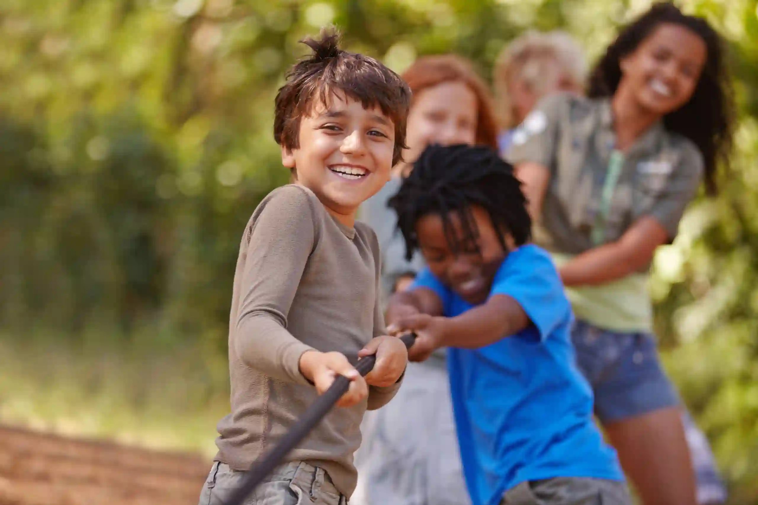 young kids in tug-o-war